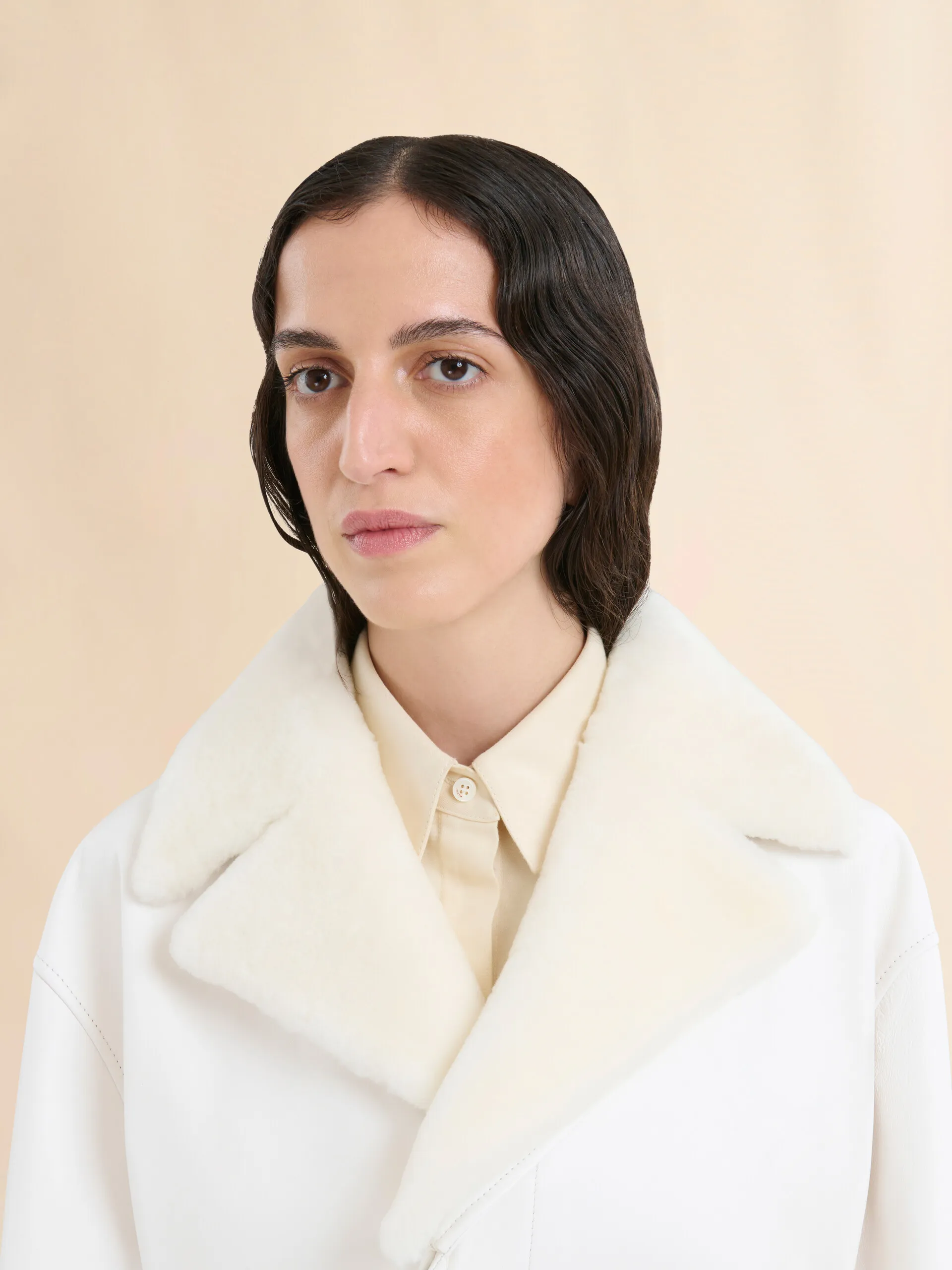 Cappotto in nappa bianca con collo in shearling