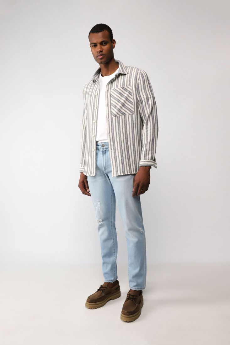 Jeans slim cropped effetto délavé con abrasioni
