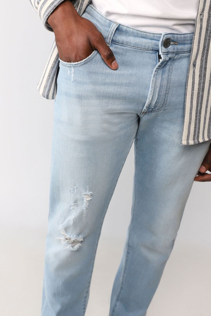Jeans slim cropped effetto délavé con abrasioni