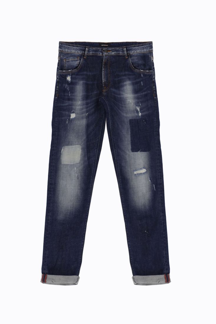 Jeans slim-fit con abrasioni e orli risvoltati