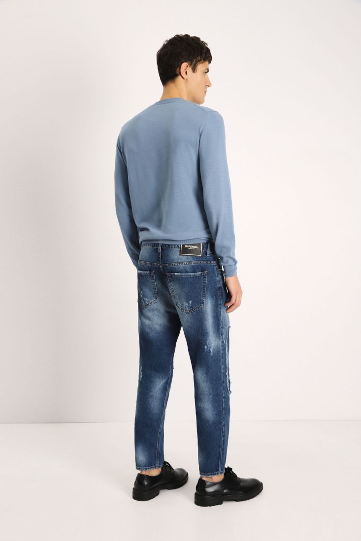 Jeans slim-fit effetto délavé con strappi